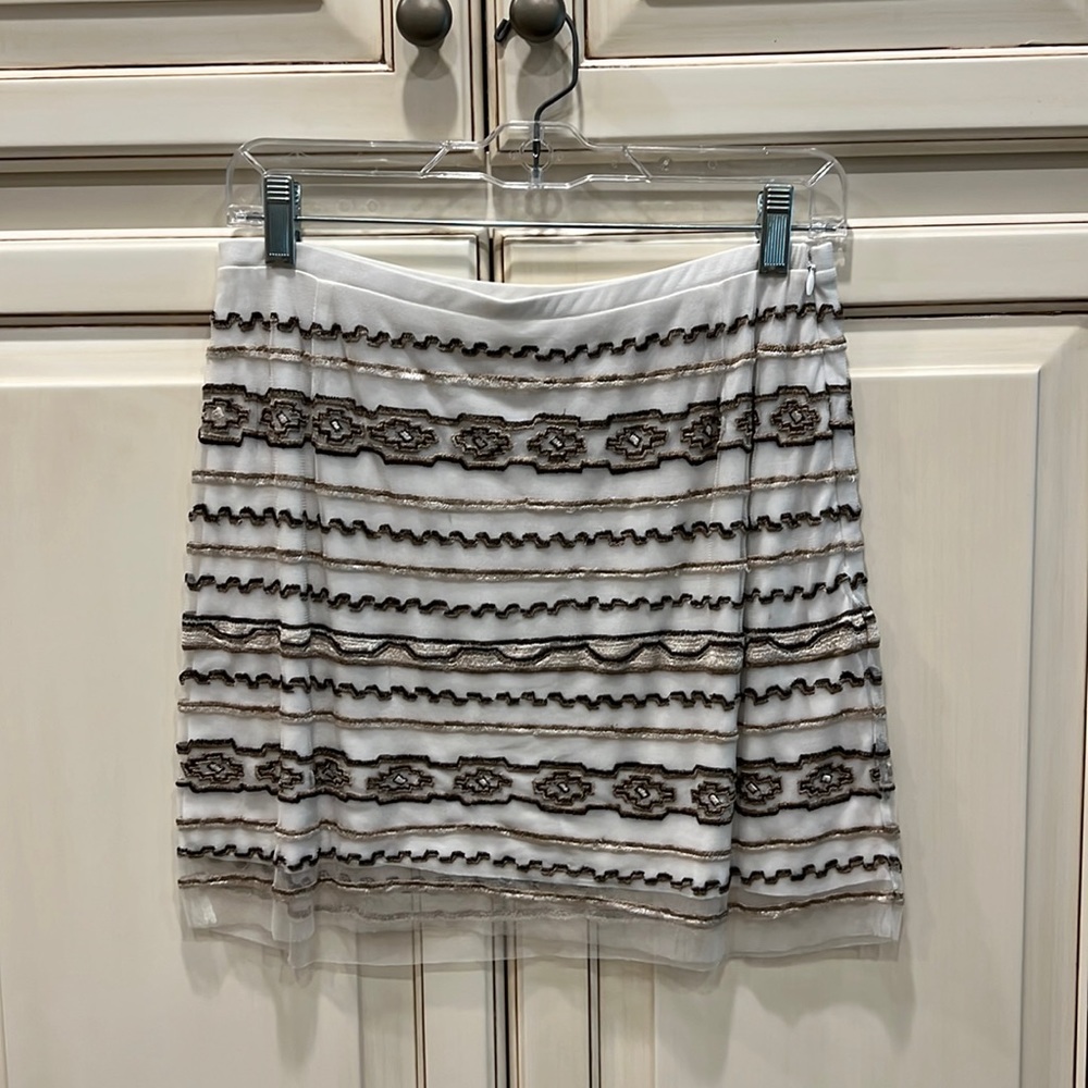 Chan Luu mini skirt. Available to shop 3/28/24